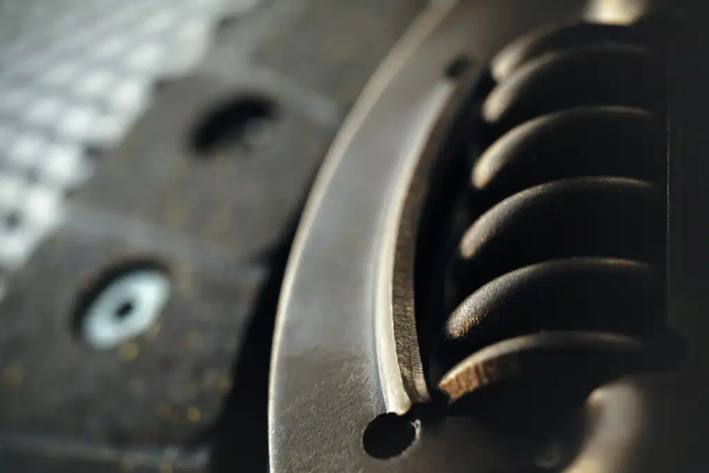 Car clutch on a metal surface